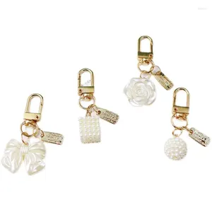 Porte-clés doux glands coeur perle porte-clés amour Bowknot étiquette en métal porte-clés casque charmes accessoires sac pendentif porte-clés de voiture