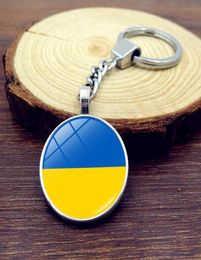 Schlüsselanhänger Ukraine Flagge Glas Cabochon Schlüsselanhänger Zubehör Ukrainisches Nationalsymbol Metall Schlüsselanhänger Tasche Charm Halter für Frauen5649510