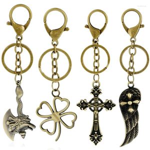 Keychains vintage retro metalen sleutelhanger bronzen hanger ringen vleugel cross vishouder voor autosleutels ketting modezak accessoires sieraden cadeau