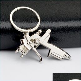 Keychains Water Spray Gun Keychain Handtassen Mannen Creatieve auto Tas Key Ring Accessoires Hanger UseF -ketens Drop levering 2 Dhseller2010 DHFD1