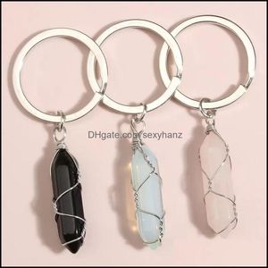 Keychains draadomslag natuursteen zeshoekige prisma sleutelringen helende kristal roze auto decor sleutelhouder sleutelhangers voor vrouwelijke mannen drop del dh4zs