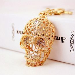 Porte-clés XDPQQ coréen créatif avec cristal crâne porte-clés voiture anneau pendentif en métal petit cadeau cadeau pour hommes