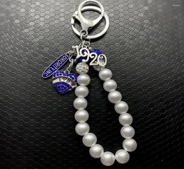 Keychains Zeta Phi Beta Sorority Society Society Ringue de la chaîne de perles blanches en métal en forme de déménage