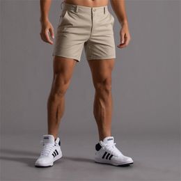 Kaki shorts mannen casual zomer stevige kleur knie lengte bermuda mode kleding reguler fit bodem dunne 220715