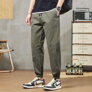 Kaki trendy werkkleding broek voor mannen in de lente en zomer, los passende capuchon Harlan casual broek, bijgesneden sportbroeken voor mannen