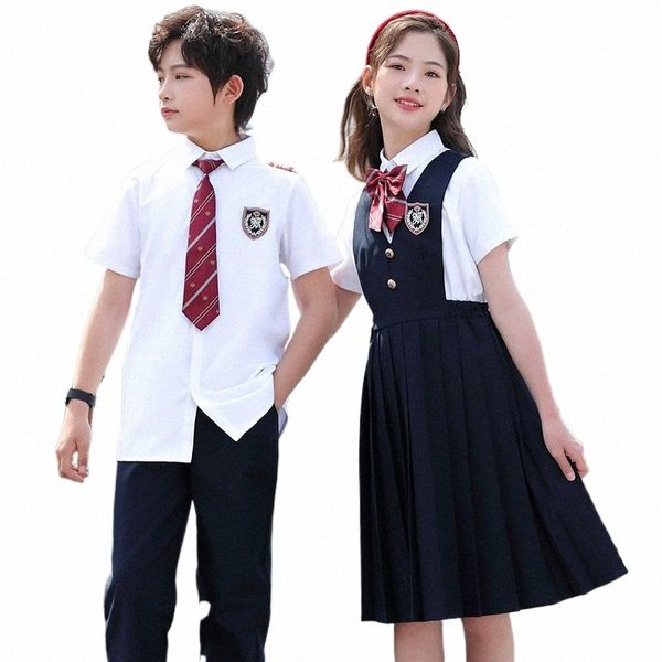 Niño uniforme escolar japonés camisa blanca azul marino plisado delantal Dr pantalones cortos pajarita para niña niño ropa conjunto estudiante traje t4vM #