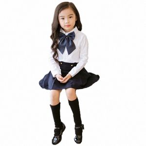 Conjuntos de ropa escolar para niños Traje de estudiantes de primaria Uniforme escolar japonés coreano Niños y niñas Camisa blanca + Falda azul marino Corbata n6p0 #