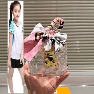 Sacs pour enfants Femmes designer mini transparent en acrylique Boîte de seau de seau de lettres imprimées blanches Modèle de fleur Lock avec écharpe en soie charmant sac à main portable Purs