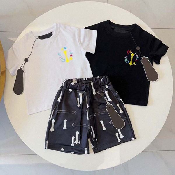 Ensembles de vêtements pour enfants T-shirt Marque Garçons Designer de luxe Filles Bébé Costumes classiques Enfants d'été à manches courtes Lettre Lettre Shorts Chemise de mode cott D1ku #