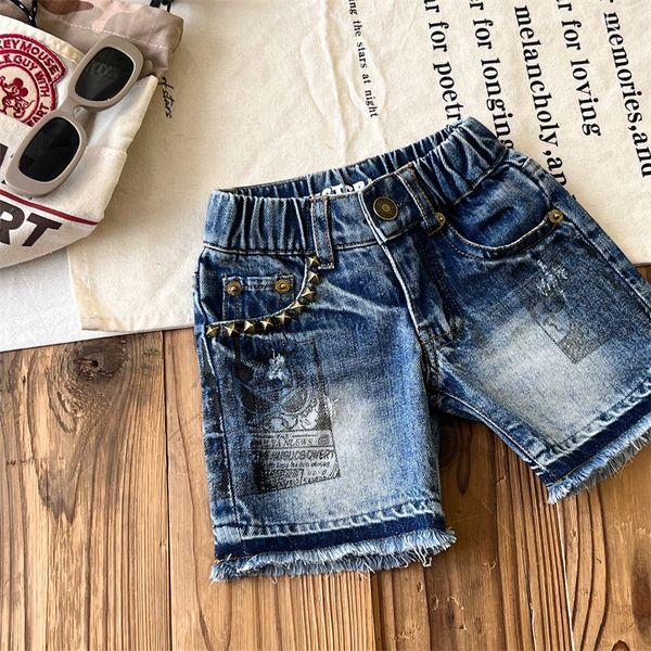 Kids Designer Cartoon Imprimé Jean Shorts Fashion Girls Rivet Pocket Pocket Tassel Denim Half Pantal