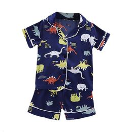 Kids Dinosaur Print Niress Baby Boy Girls Pamas Button T -shirt Shorts Outfits Peuter slaapkleding Set L2405