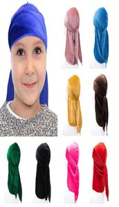 Kinderen Durags unisex vaste kleur fluweel ademende lange staartbandana kinderhoed tulband tulband durag cap headban hoofden haaraccessoires be6512943