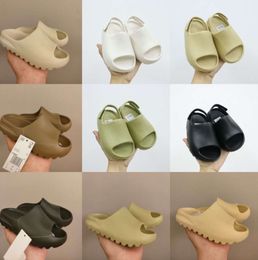 Zapatillas de corredor de espuma Eva para niños Zapato de bebé Niños Niñas Zapatillas de deporte antideslizantes de diseñador Diapositivas para niños Niños pequeños Bebés Zapatos de desierto para niños Sandalias de resina ósea