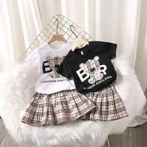 Kindermeisjes kleden zomerkleding sets korte mouw top t-shirt geruite rokken kinderen babykleding set 2 stks