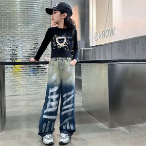 Jeans pour enfants pour filles Fashion Graffiti Dyeing 2024 Spring Autumn S Pantalon à jambes larges uniques pantalon coréen