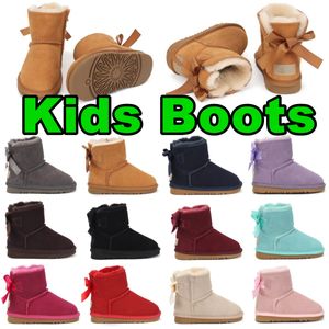 Chaussures pour enfants Australie Bottes chaudes Mini avec nœuds Ugglie Tellders Baskets pour garçons Baskets de créateurs en cuir Chaussures d'hiver pour jeunes Bowknot Chaussures pour filles de haute qualité