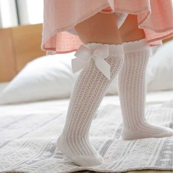 Chaussettes pour enfants 0-2y Style espagnol Baby Girls chaussettes Bows Gnee High Children Chaussettes Toddlers Tube Long chaussette Hollow Out Princess High Fishnet chaussettes Y240504