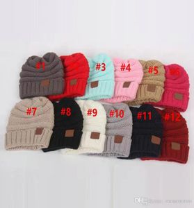 Enfants hiver chaud chapeau tricoté chapeau étiquette enfants Chunky extensible enfants tricotés bonnets bébé chapeau bonnet Skully chapeaux 12 couleur DHL3569955