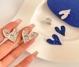 Klein Blue Creative Irregular Love Silver Naald Charm Persoonlijkheid Metalen oorbellen Ear Clip Jewelry4745316
