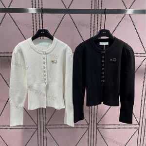 Prendas de punto para mujer nuevo otoño diseño de manga abullonada suéter Casual falso cárdigan de punto Top