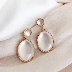 Corée nouveau blanc clair de lune oeil de chat pierre boucles d'oreilles pour les femmes petit frais géométrique goutte élégant dames tempérament bijoux