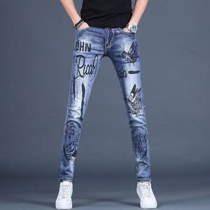 Version coréenne jean bleu pour hommes jean extensible mince de haute qualité jean de luxe léger imprimé papillon jean de rue élégant et Sexy;240131