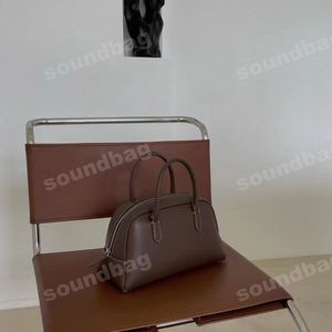 Sac Boston de marque de créateur coréen, sac à main en cuir véritable, fourre-tout minimaliste printemps et été à la mode et polyvalent, sac de trajet en cuir haut de gamme en daim crème