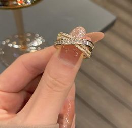 Anillo de Cruz Roja de red de moda de puerta este coreana para mujer con incrustaciones de anillo ajustable de metal de diamante ancla joyería 1155959