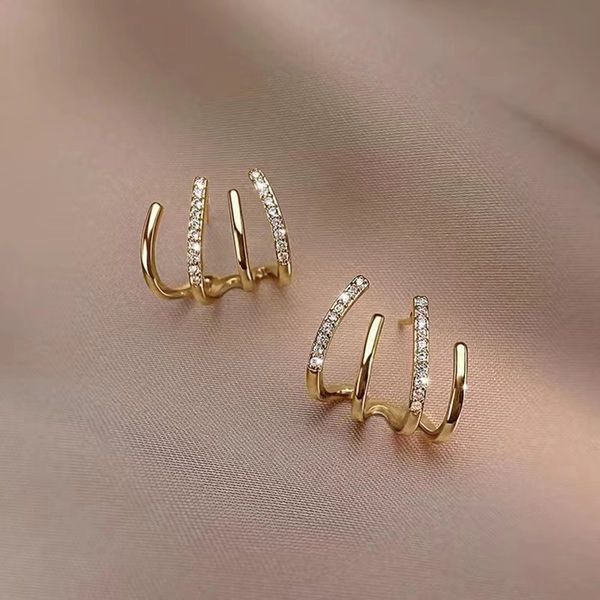 Boucles d'oreilles de luxe de tendance de la mode coréenne pour les femmes perçant quatre griffes géométrie zircon bijoux oreille de poignée