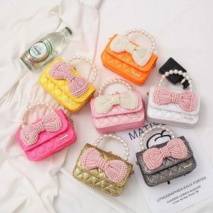 Mini sacs à main coréens pour enfants, jolis sacs à bandoulière avec nœud papillon en perles pour bébés filles, petite pochette pour pièces de monnaie, sac à main de fête, cadeau, 2021