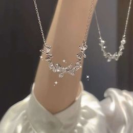 Collier pendentif coréen en acier titane avec nœud en diamant incrusté de micro