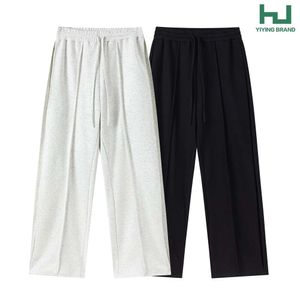 Koreaanse minimalistische en niche draperende trekkoordzijde geplooide sanitaire broek voor mannen en vrouwen met rechte en losse casual broek