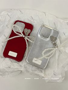 Koreaanse eenvoudige luxe dermatoglyph parel strik hanger effen kleur telefoonhoes geschikt voor iPhone 11 12 13 14 Pro Max schokbestendige achterkant 240117