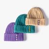 Coréen cousu cruelle bonnets hiver hiver hiver thicke chaud extérieur voyage woolen bonnet femme ski chapeau tricoté en gros