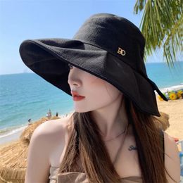 Sombrero de sol de estilo coreano para mujeres en verano Bowknot grande Brim uv Prote Sunshade Pescador plegable Hat240409
