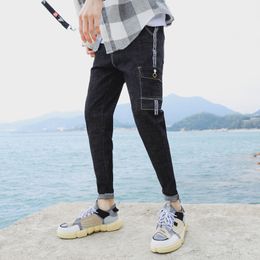 Style coréen simplicité à la mode poche personnalisée décoratif Stretch hommes jean court hommes ruban bord noir jean hommes