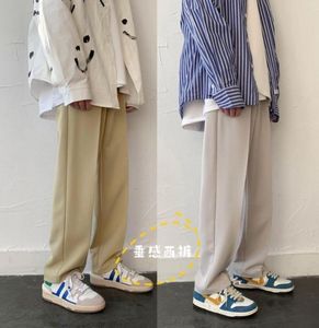 Koreaanse stijl Wide Leg Pants Men039S Fashion Solid Color Casual Pants Men Streetwear Losse Drawstring Dress Heren broek6109425