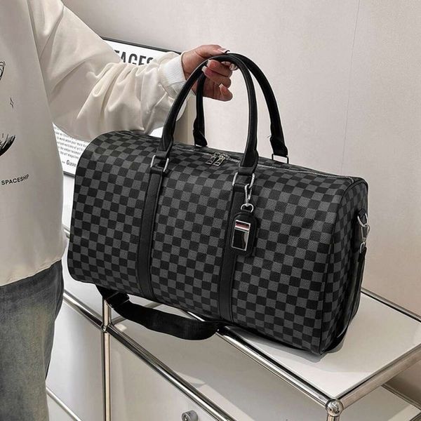 Versión coreana de Hand Lage Viaje de negocios para hombres y mujeres Viaje de gran capacidad Bolso cruzado diagonal con un solo hombro, bolso Fiess 2024 78% de descuento en tienda al por mayor