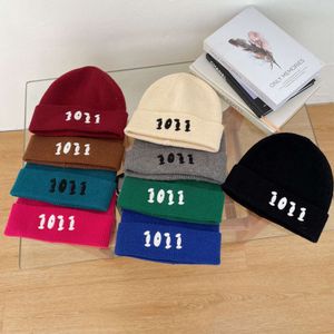 Versión coreana del minimalista Igital Embroiere Chilren's Winter Warmth Instagram Versátil para que los estudiantes muestren su gorro tejido de cara pequeña