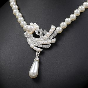 Version coréenne de la boucle d'oreille de collier de perle populaire avec accessoires polyvalents pour la robe de mariée
