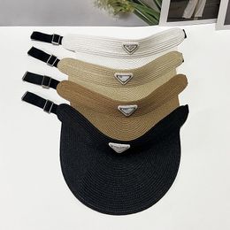 Versión coreana de sombrero de copa vacío tejido de paja sombrero de visera de protección solar de viaje de verano femenino aleros grandes cubierta de la cara etiqueta de triángulo de moda sombrero de paja en topless