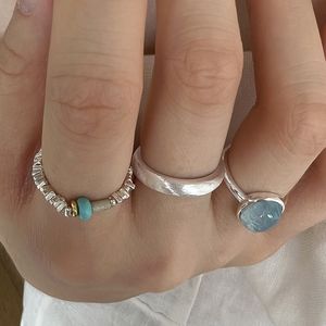 Koreaanse versie van de ring, nichemode voor dames, persoonlijkheid, high-end gevoel voor licht, luxe matte effen cirkel, verpletterde zilveren blauwe diamanten ring, eenvoudig en veelzijdig