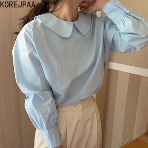 Korejpaa femmes chemisier mode coréen Chic doux crème bleu solide poupée col haut dos creux pli bulle manches chemise élégant 210526