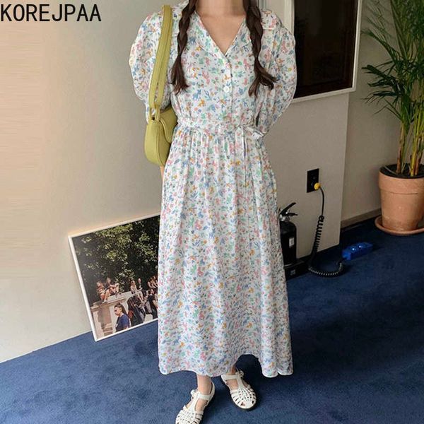 Korejpaa vestido de mujer verano reductor de edad dulce solapa pantalla completa estampado de dibujos animados tres botones con cordones Puff manga Vestidos 210526