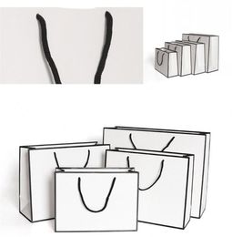 Sacs de papier Kraft épaississer les sacs d'emballage de carte blanche Advertising Fashion Storage Handsbag Shopping Party Customalized 1 86gr B27473120