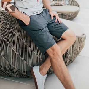 KUEGOU katoen effen kleur heren shorts zomer broek micro stretch casual slanke mode shorts voor mannen plus size KK-2920 210714