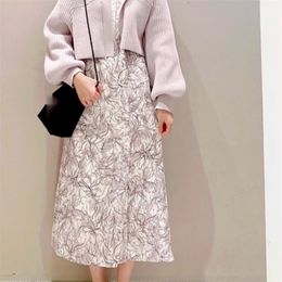 Kuzuwata printemps été femme vêtements japon Style tempérament bureau dame jupes imprimer taille haute mince fendu fourche sirène jupe 210629