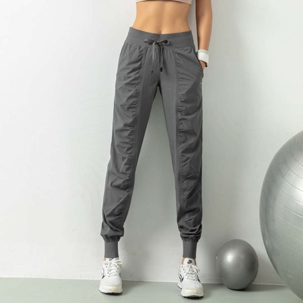 L-009 Pantalons de Jogging de Yoga pour femmes pantalons de survêtement amples pour femmes pantalons de sport de Fitness joggeurs en cours d'exécution pantalons de survêtement amincissants pour les pieds