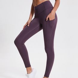 L-01 Spandex Pantalones de yoga para mujer Trajes Deportes sólidos Ropa de gimnasia Leggings de entrenamiento de cintura alta Elástico Fitness Señora Medias generales Pantalones Bolsillos laterales