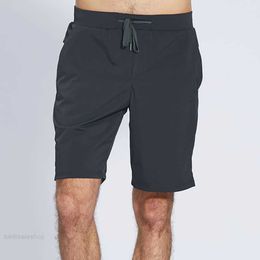 L-07 Hombres pantalones cortos de yoga de secado rápido Los pantalones de chándal de la fitness de verano tienen pantalones cortos de deportes de dibujo ceñido con top de entrenamiento de bolsillos traseros